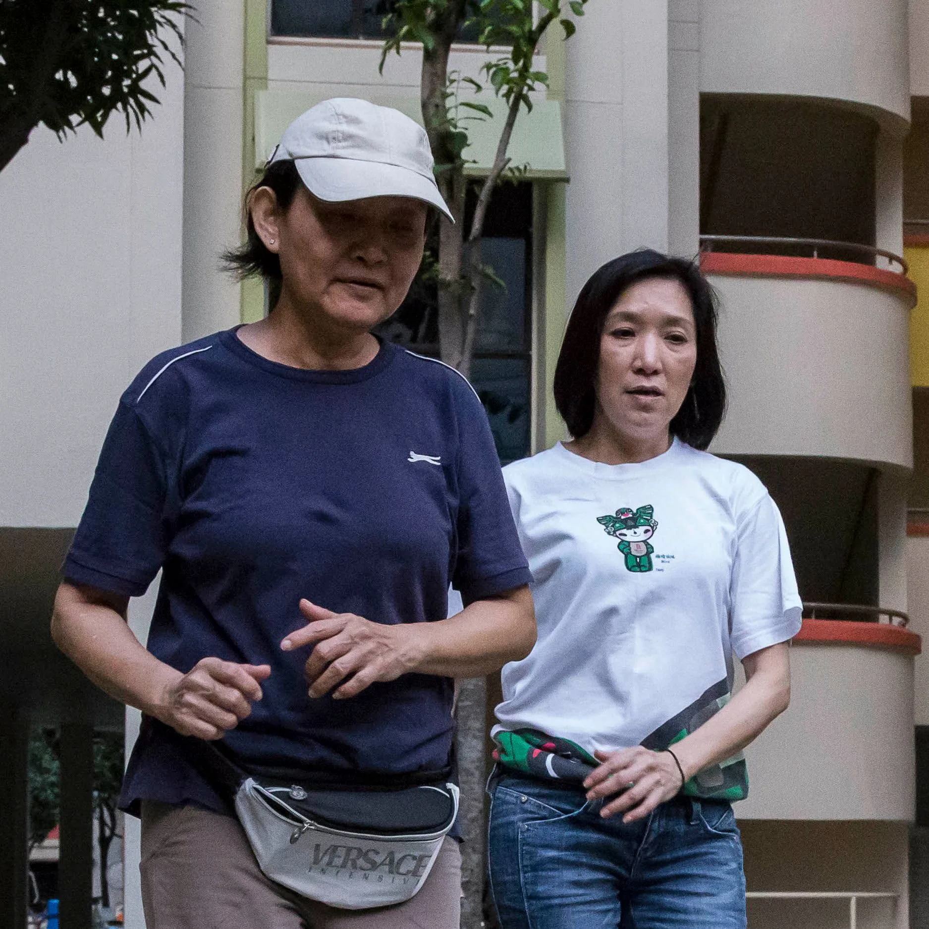 Colleen and Ann Chiam exercise together